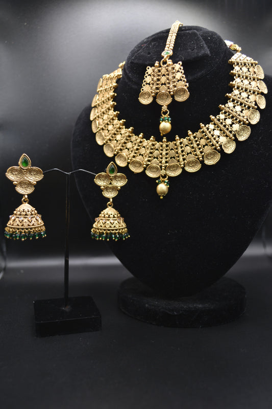 Regal Gold and Emerald Jewelry Set